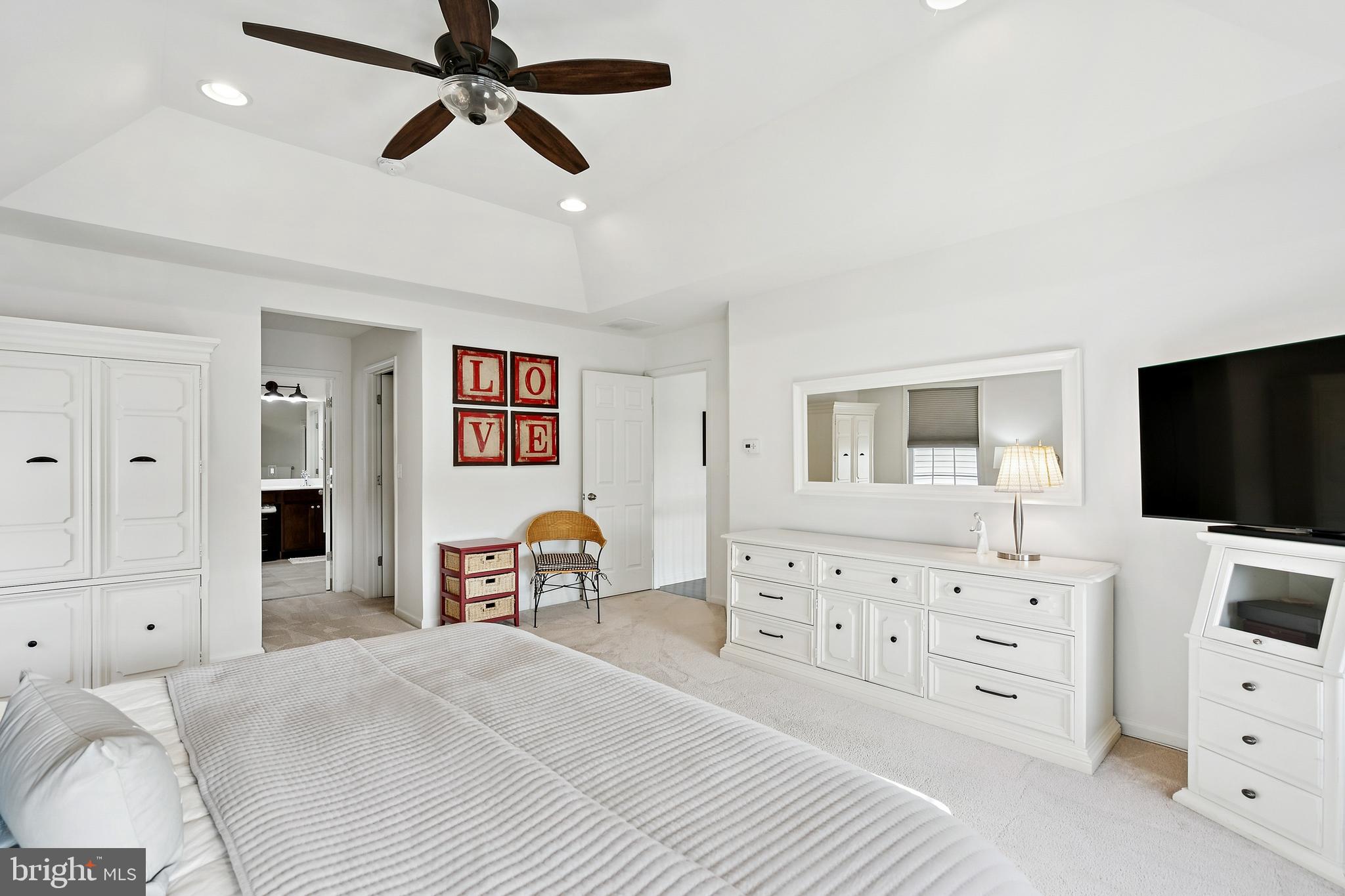 3 Antron Brown Way Chesterfield, NJ 08515 - Photo 16 of 28 a bedroom with furniture and a flat screen tv