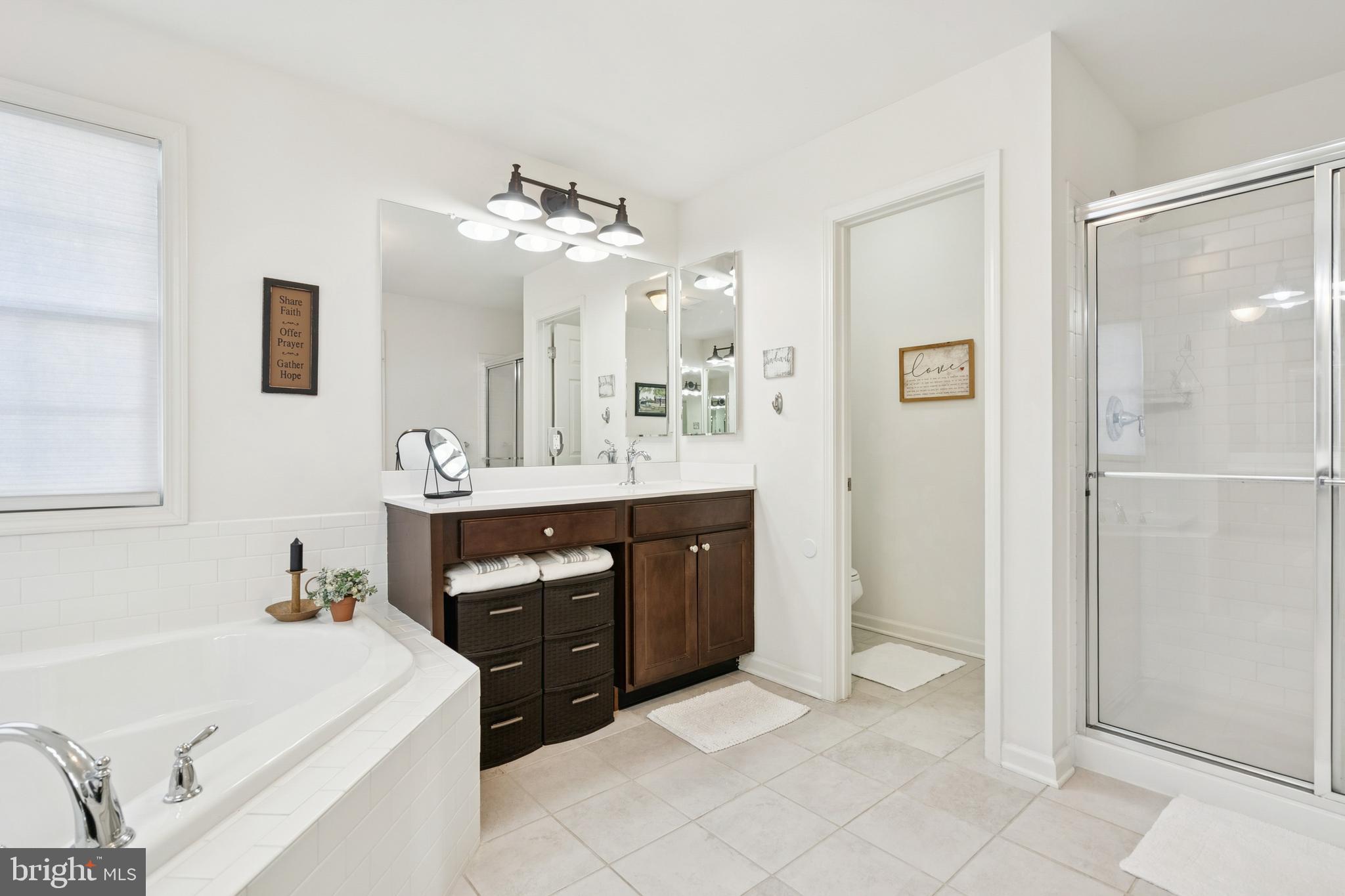 3 Antron Brown Way Chesterfield, NJ 08515 - Photo 18 of 28 a en suite bathroom with a double vanity sink a mirror and a