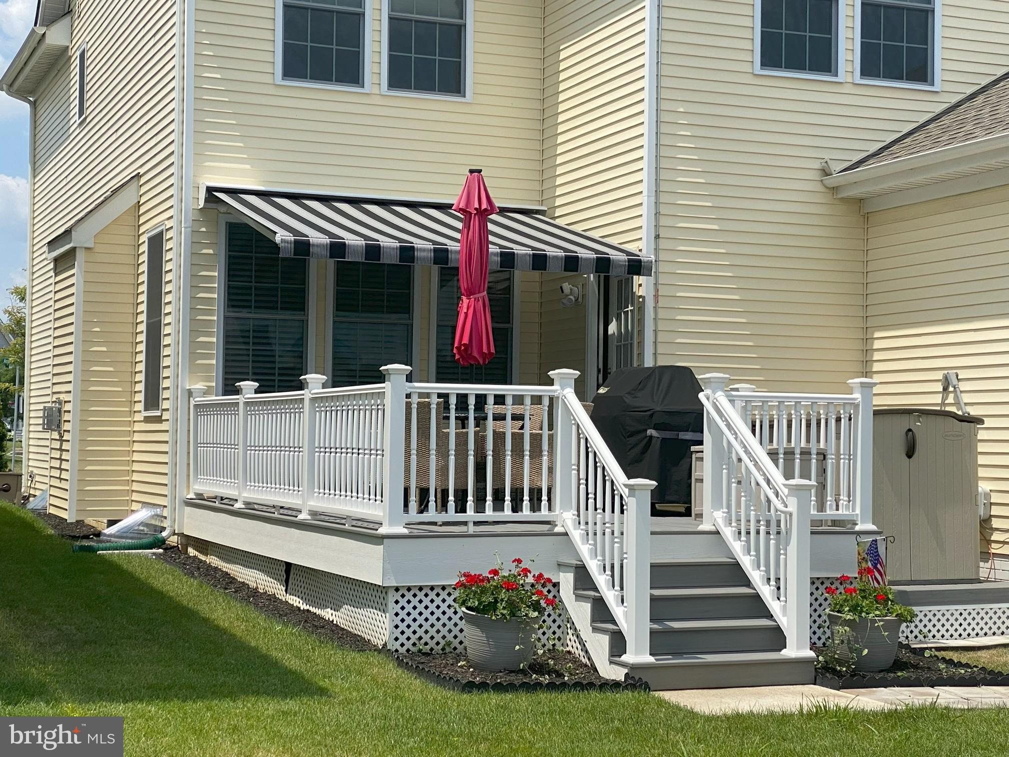 3 Antron Brown Way Chesterfield, NJ 08515 - Photo 25 of 28 a view of a house with a small yard and wooden fence