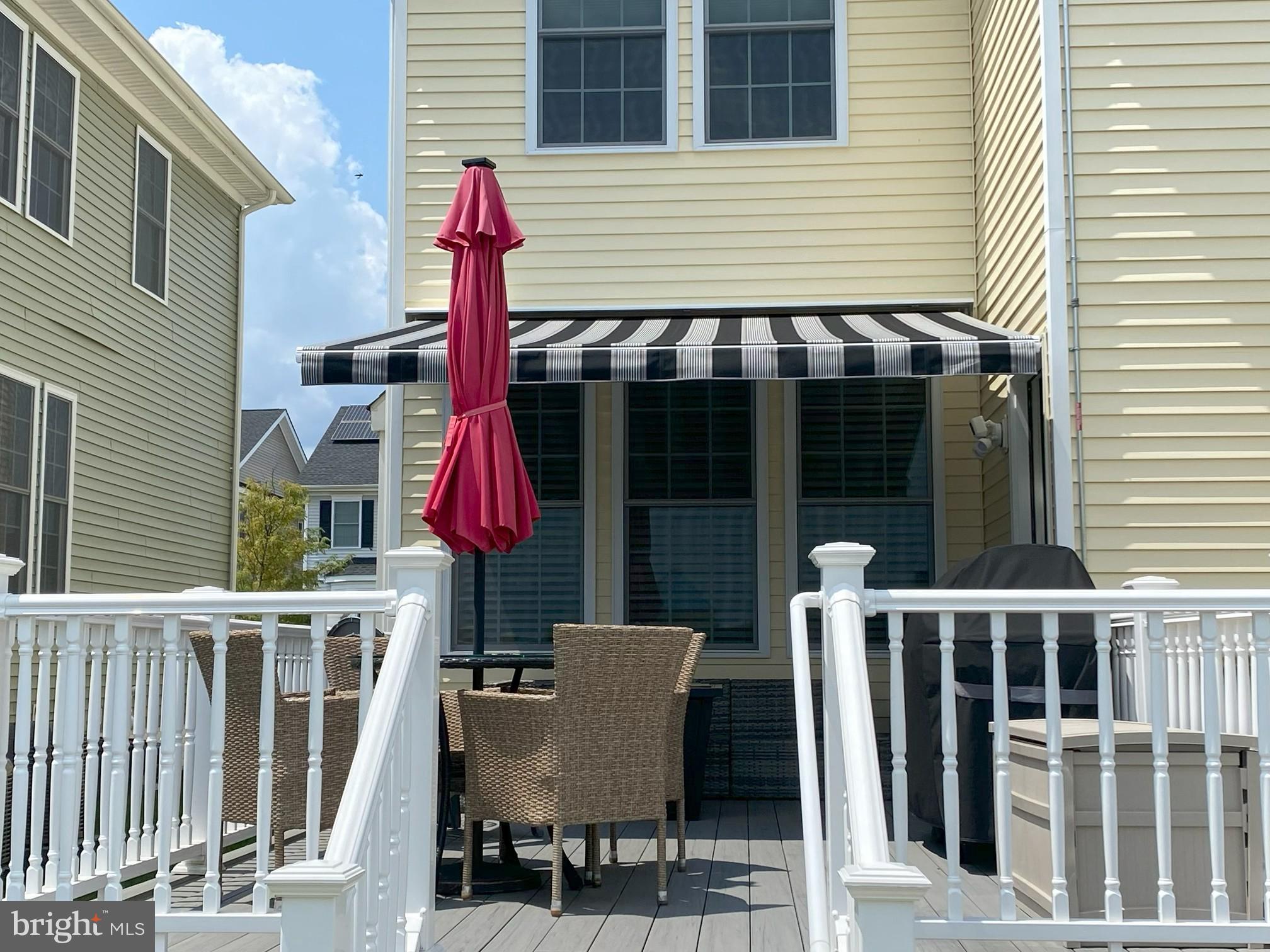 3 Antron Brown Way Chesterfield, NJ 08515 - Photo 26 of 28 a table and chairs in front of a house