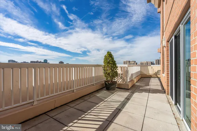 a view of a balcony with city view