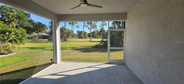 a view of a room with a large window