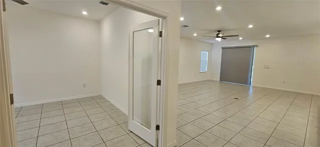 an empty room with an entryway