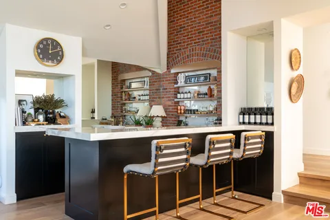 a dining table chair with a large window