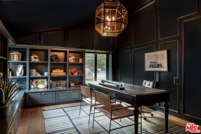 a view of a workspace with furniture