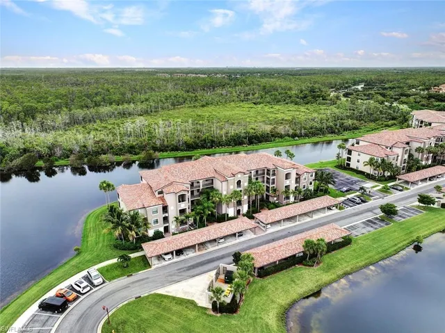 a view of a garden with a lake view