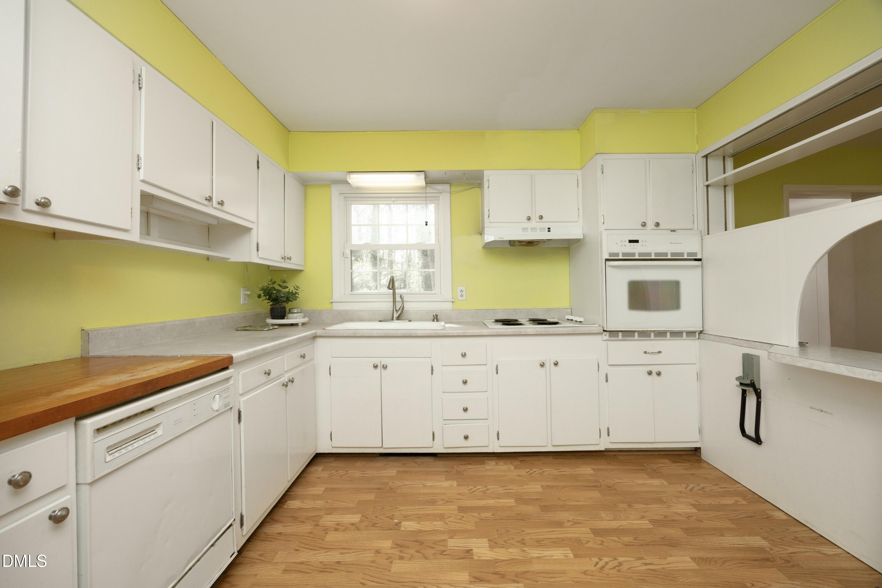 1526 Euclid Road Durham, NC 27713 - Photo 16 of 42 Kitchen with wall oven and dishwasher