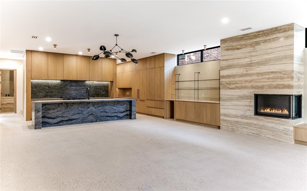 6145 Llano Avenue Dallas, TX 75214 - Photo 8 of 40 a living room with furniture and a fireplace