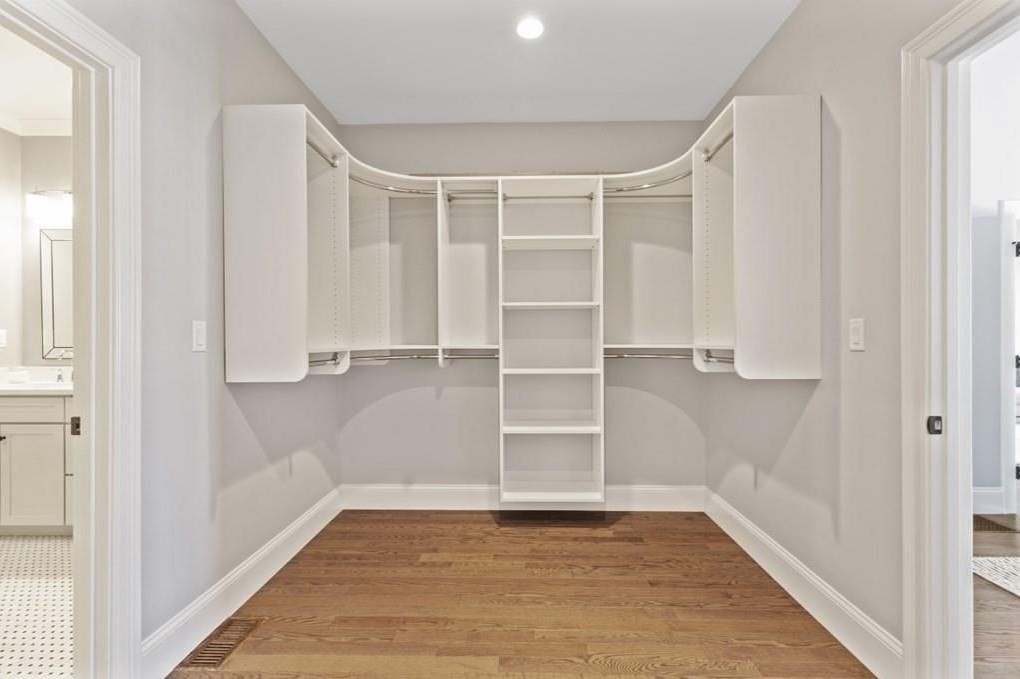 30 Waterville Lane, Unit 30 Hopkinton, MA 01748 - Photo 9 of 22 a view of walk in closet with empty racks