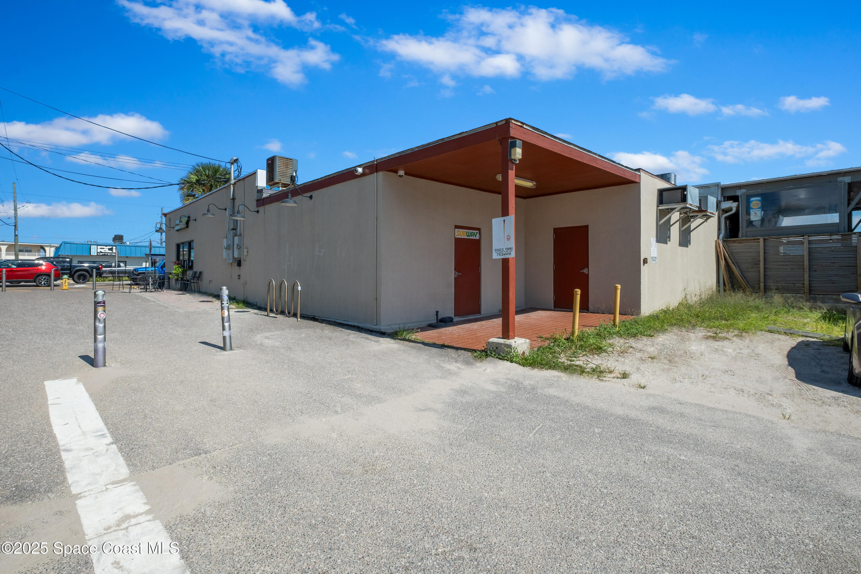 26 South Atlantic Avenue Cocoa Beach, FL 32931 - Photo 11 of 62 a view of a house with a yard