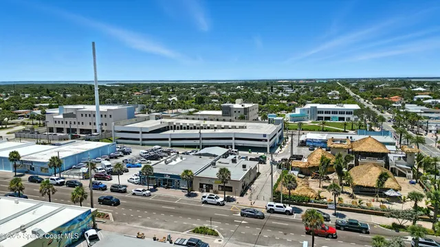 an aerial view of a building with outdoor space