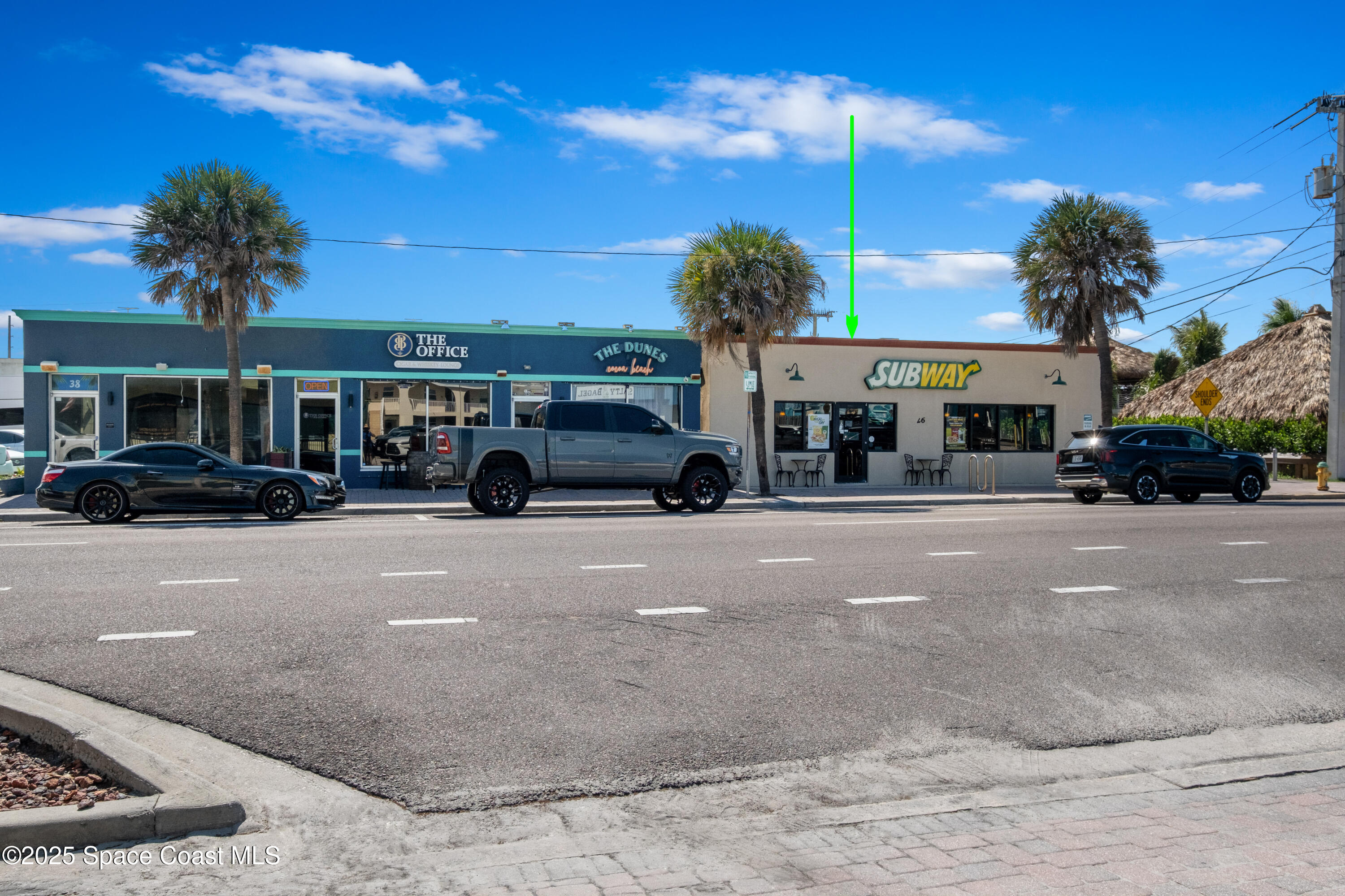 26 South Atlantic Avenue Cocoa Beach, FL 32931 - Photo 9 of 62 a view of street with parked cars