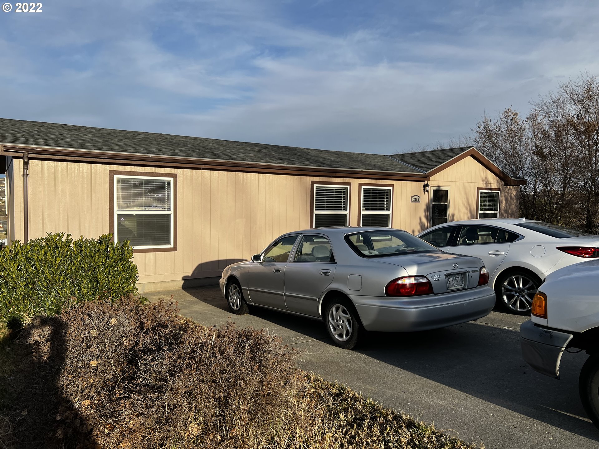 3065 Southwest Overlook Place Pendleton, OR 97801 - Photo 3 of 29 a car parked in front of a house