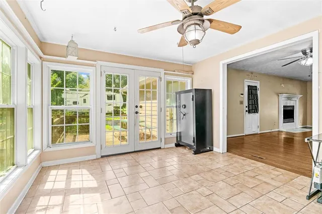 a view of an entryway with wooden floor