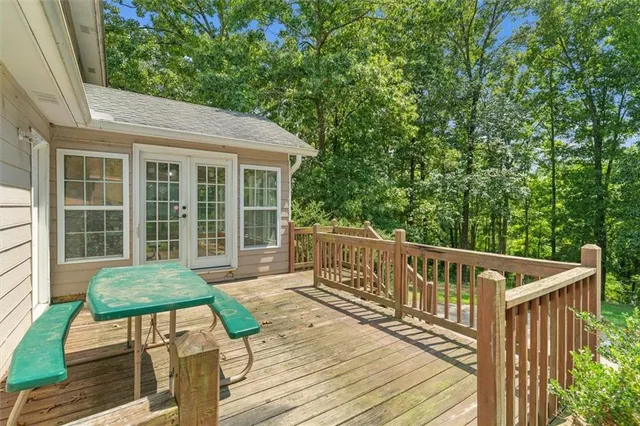a porch with a yard in back