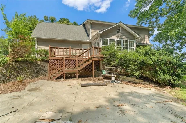 a big yard with lots of green space and trees