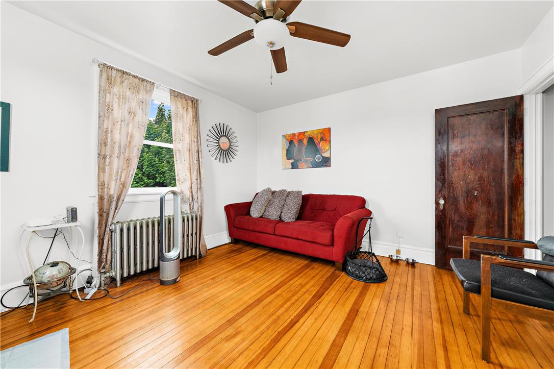 2055 Ferry Street Wilson, PA 18042 - Photo 15 of 21 This inviting room features hardwood floors and a window offering a lush outdoor view.
