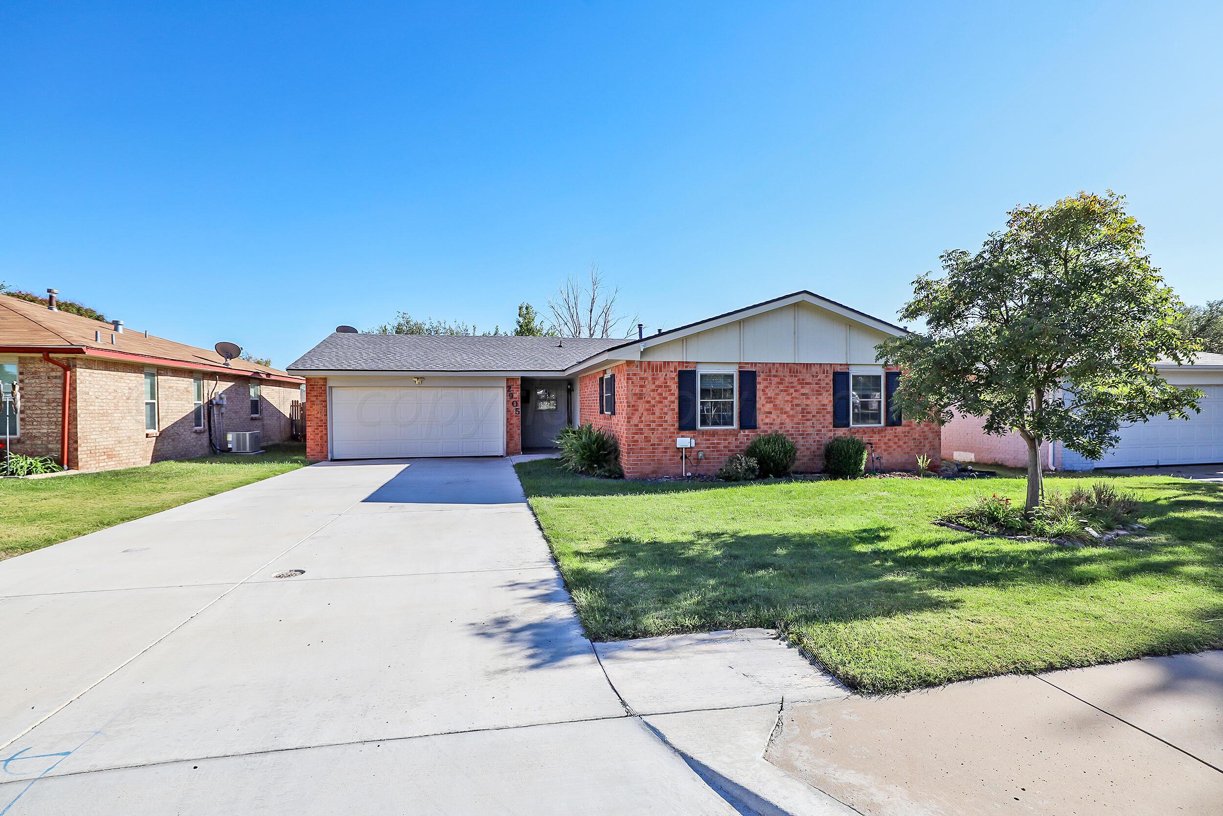 2905 Salem Drive Amarillo, TX 79110 - Photo 2 of 29 a front view of a house with a yard