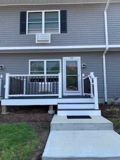 200 Post Road, Unit 312 Warwick, RI 02888 - Photo 2 of 14 New vinyl siding, new composite deck, new windows & door, new roof