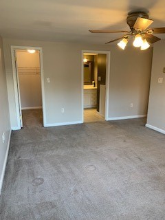 200 Post Road, Unit 312 Warwick, RI 02888 - Photo 10 of 14 Primary Bedroom - view into walk-in closet and full bath
