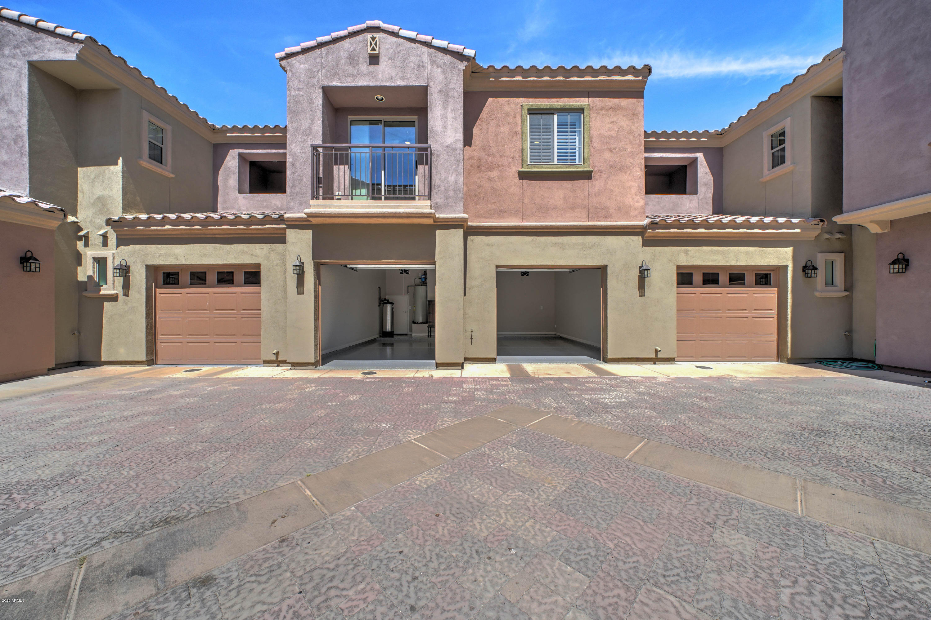 3935 East Rough Rider Road, Unit 1272 Phoenix, AZ 85050 - Photo 29 of 35 Driveway to Garage