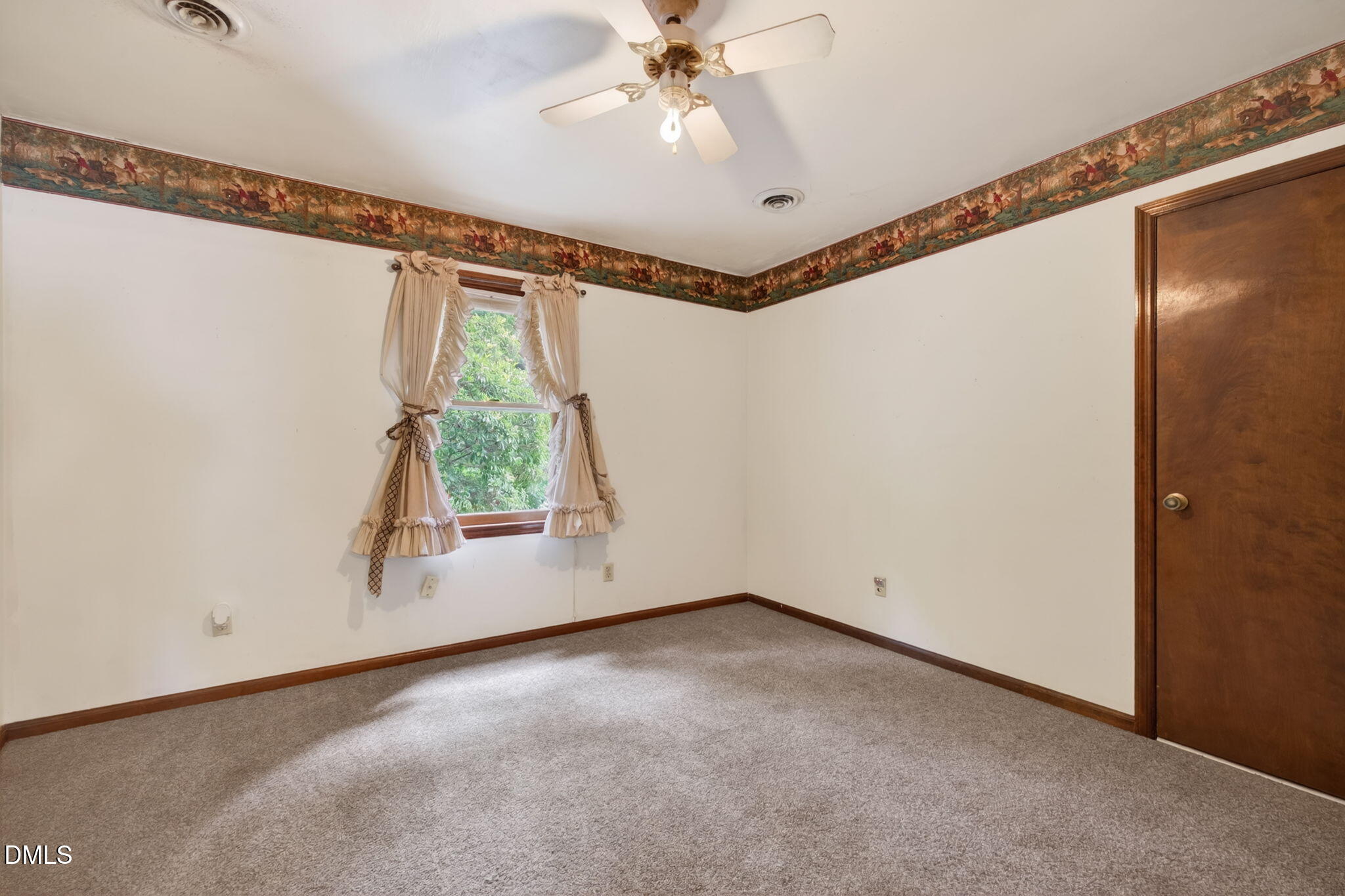 350 Grantham School Road Goldsboro, NC 27530 - Photo 22 of 49 a view of room with window and a ceiling fan