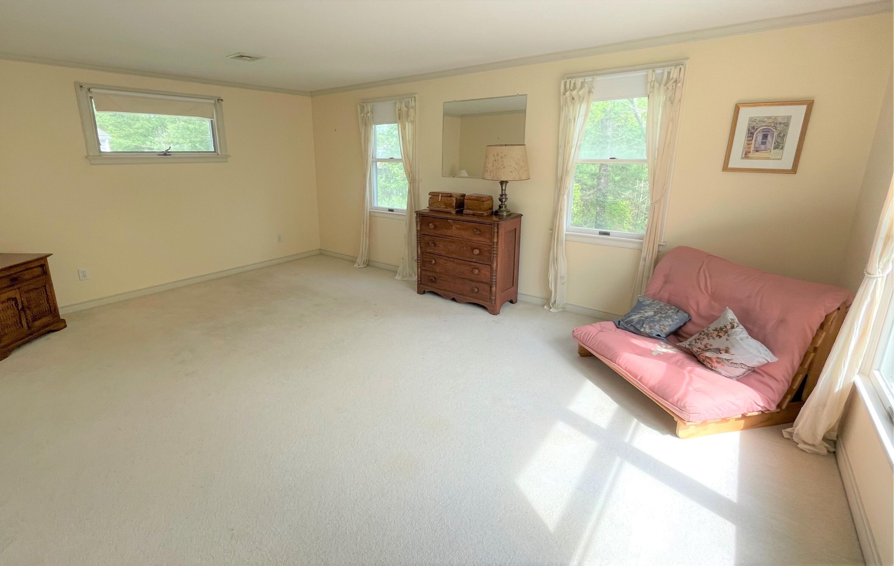 174 Tanglewood Drive Osterville, MA 02655 - Photo 16 of 34 a living room with furniture and a window