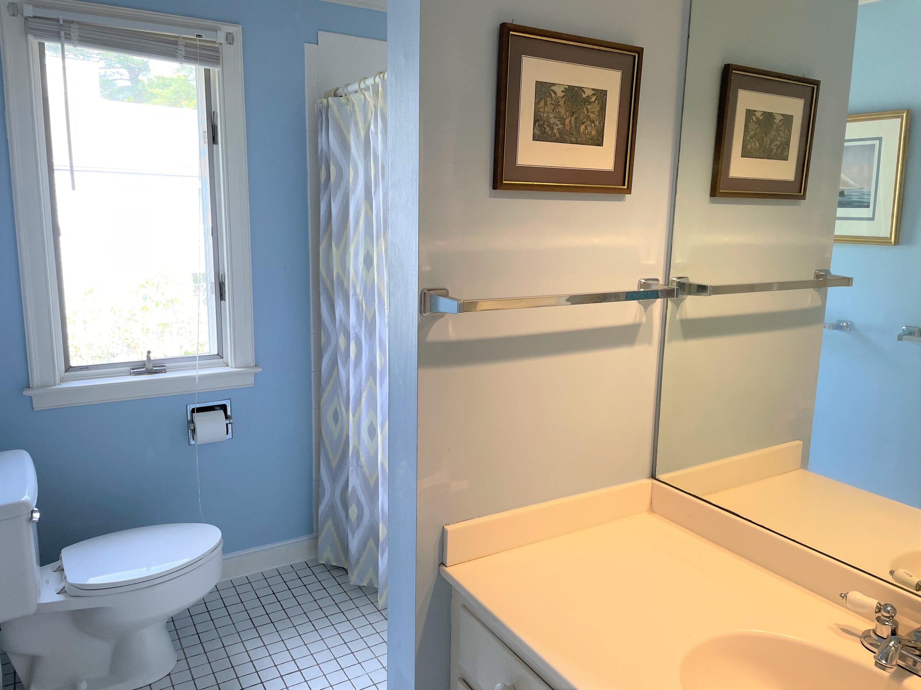 174 Tanglewood Drive Osterville, MA 02655 - Photo 18 of 34 a bathroom with a sink and a toilet
