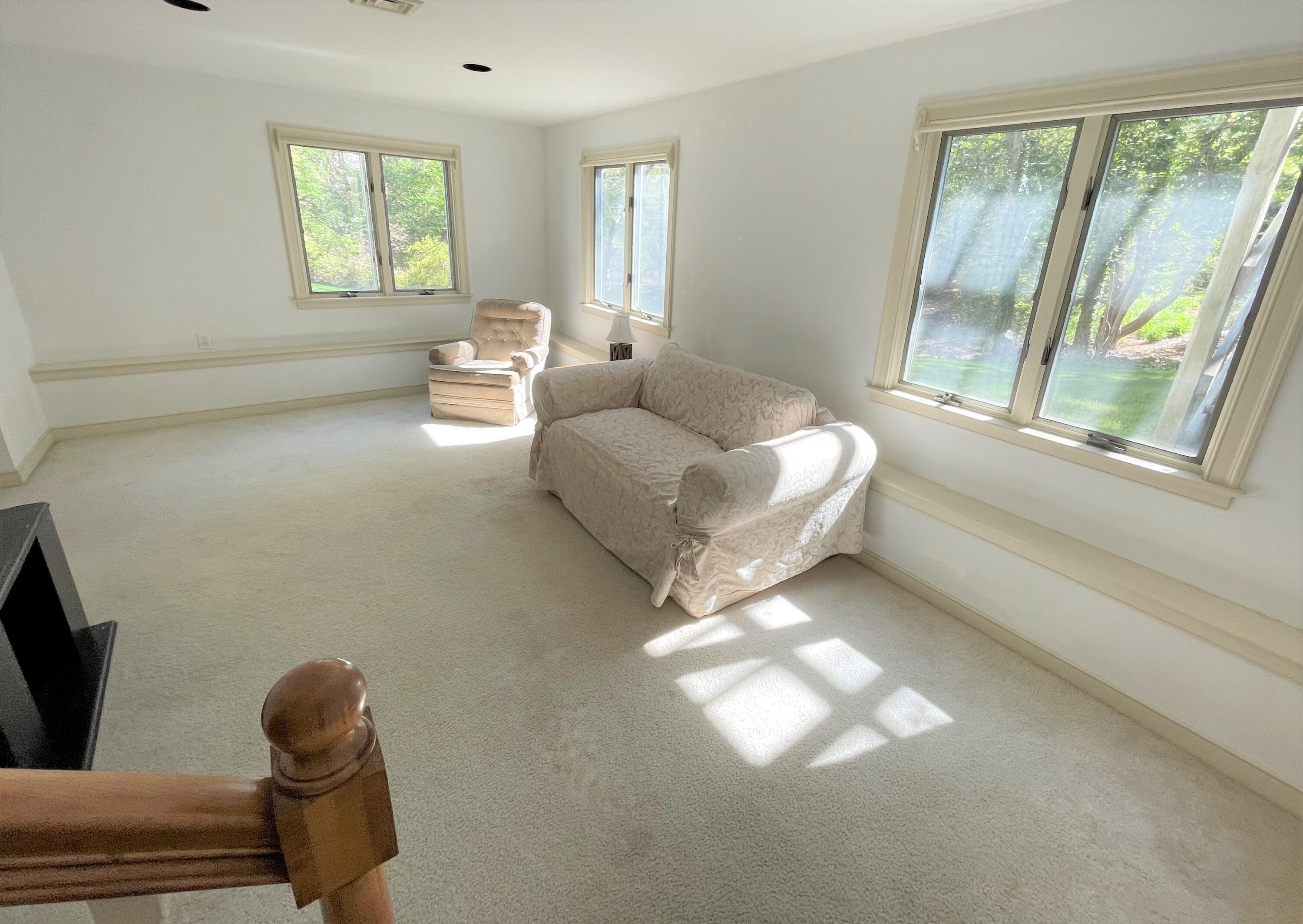 174 Tanglewood Drive Osterville, MA 02655 - Photo 21 of 34 a living room with furniture and a window