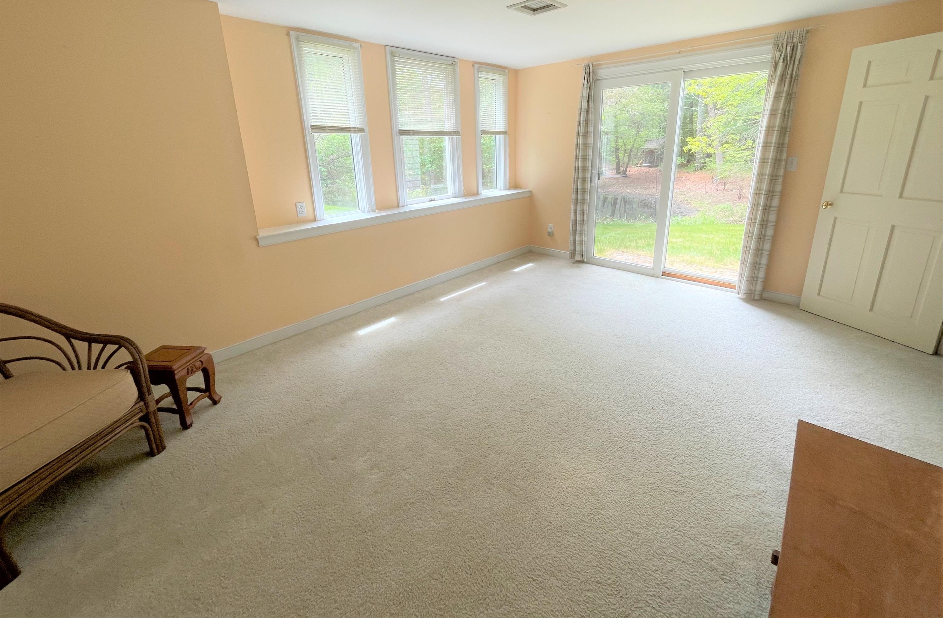 174 Tanglewood Drive Osterville, MA 02655 - Photo 22 of 34 a view of an empty room with a window