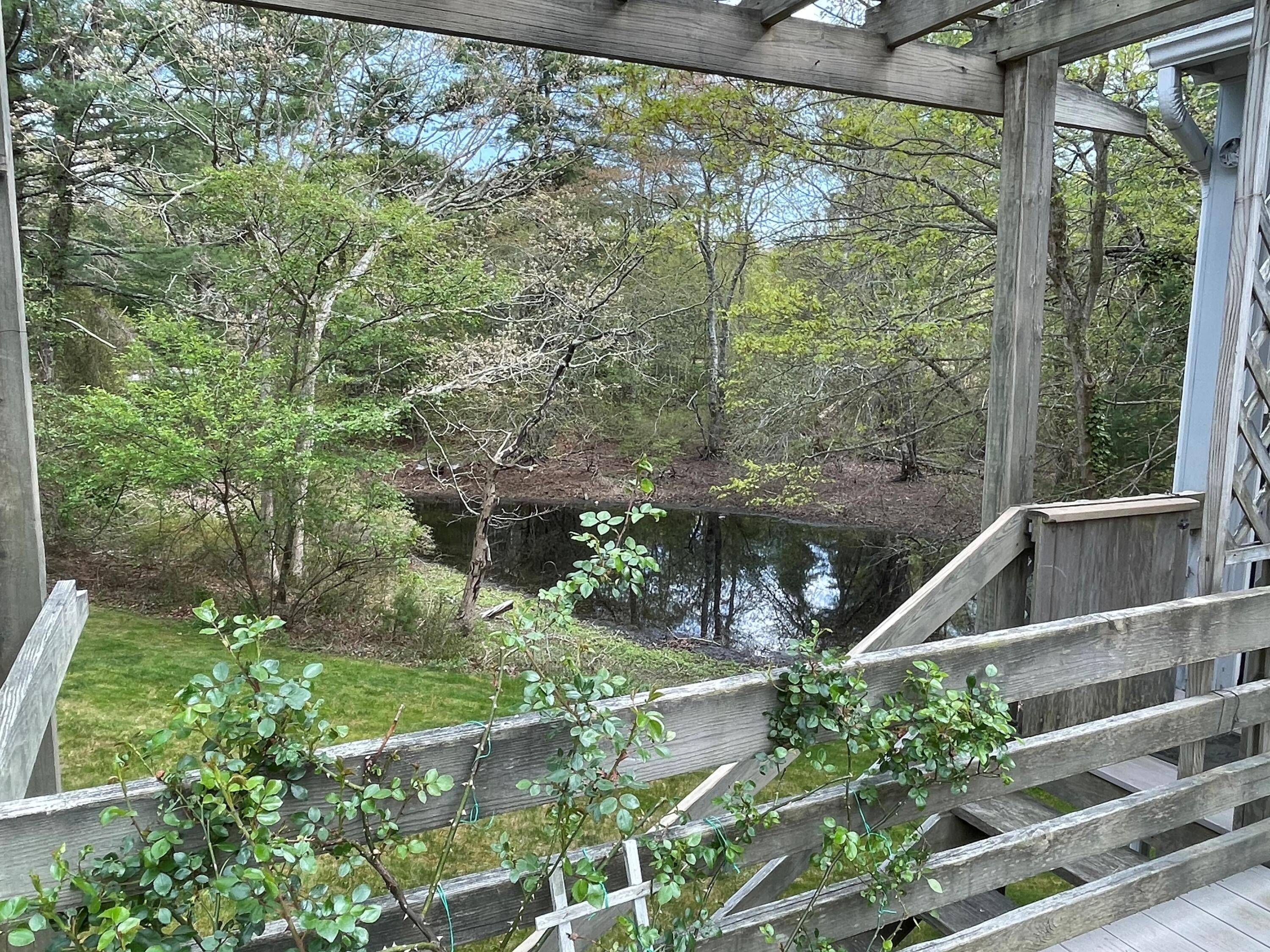 174 Tanglewood Drive Osterville, MA 02655 - Photo 25 of 34 a view of a balcony with yard