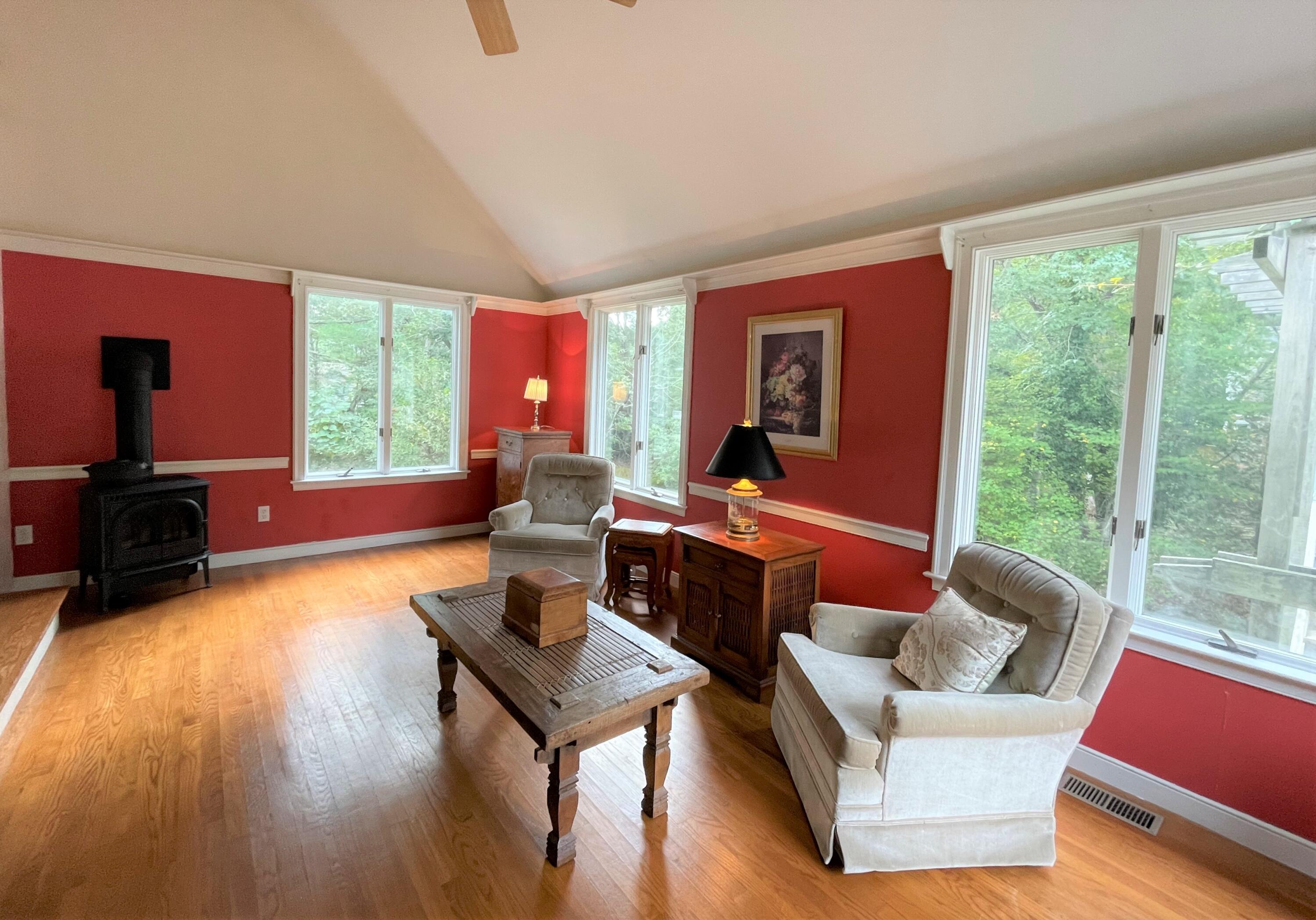 174 Tanglewood Drive Osterville, MA 02655 - Photo 10 of 34 a living room with furniture and a large window