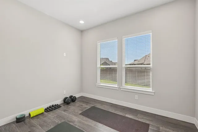 a view of a room with windows