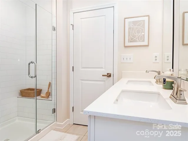 a bathroom with a sink and a shower