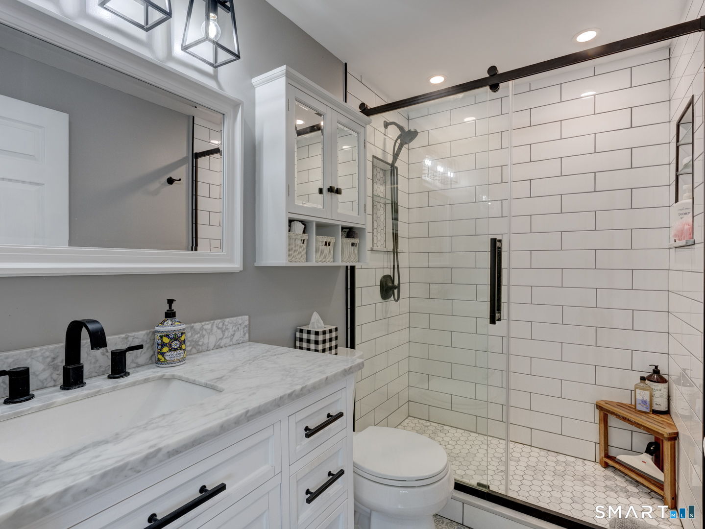 39 Freedom Drive Canton, CT 06019 - Photo 14 of 37 a bathroom with a sink a toilet and shower