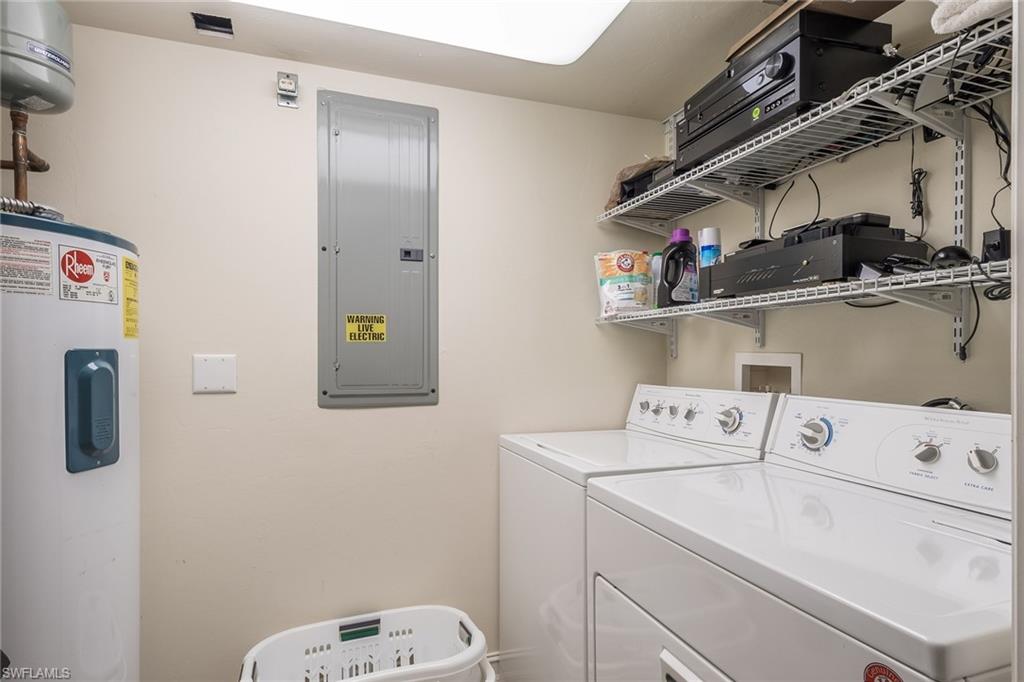 445 3rd Avenue South, Unit 102 Naples, FL 34102 - Photo 14 of 26 a utility room with dryer and washer