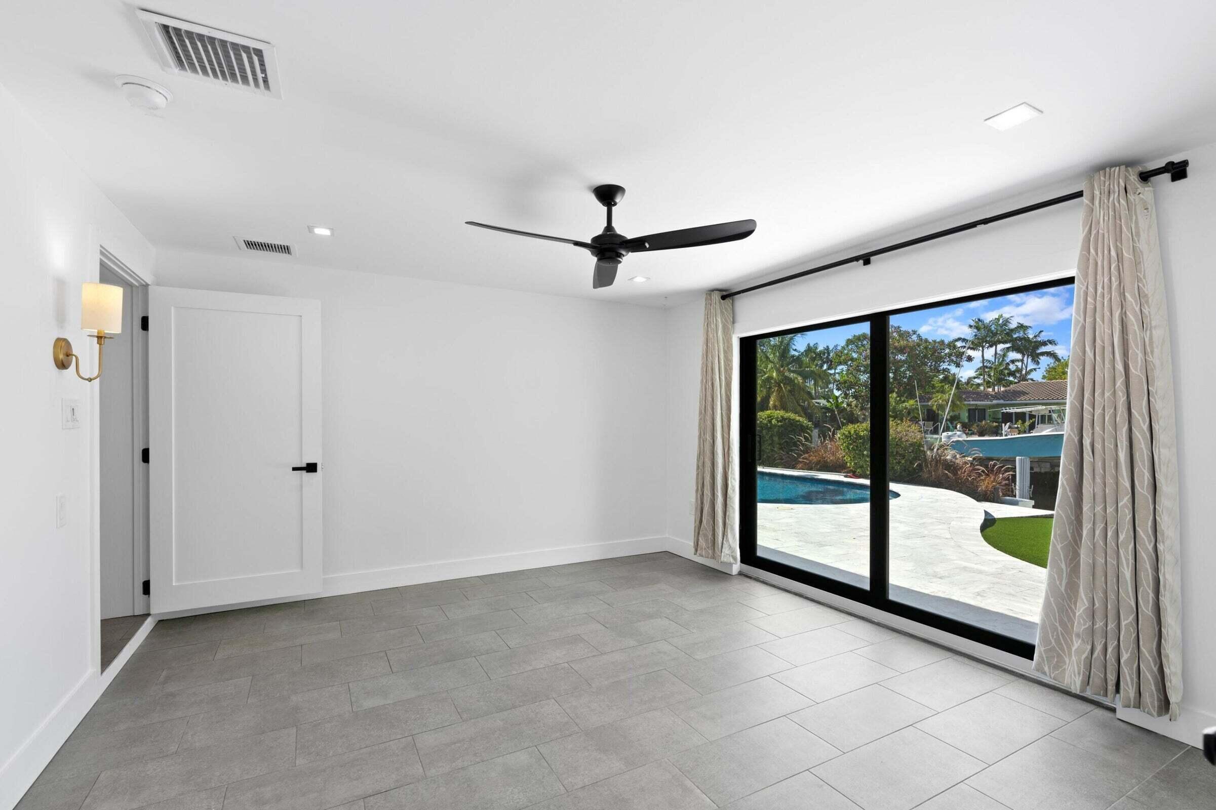 2310 Northeast 49th Street Lighthouse Point, FL 33064 - Photo 11 of 23 Primary Bedroom