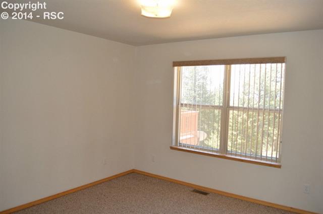 31 Spruce Creek Road Divide, CO 80814 - Photo 10 of 12 Secondary bedrooms are spacious and comfortable.