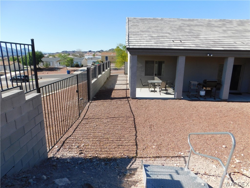 3370 South Ridge Avenue Bullhead City, AZ 86429 - Photo 10 of 56 a view of a balcony with furniture