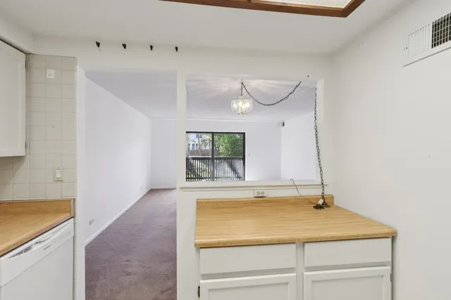 a bathroom with a sink and a window