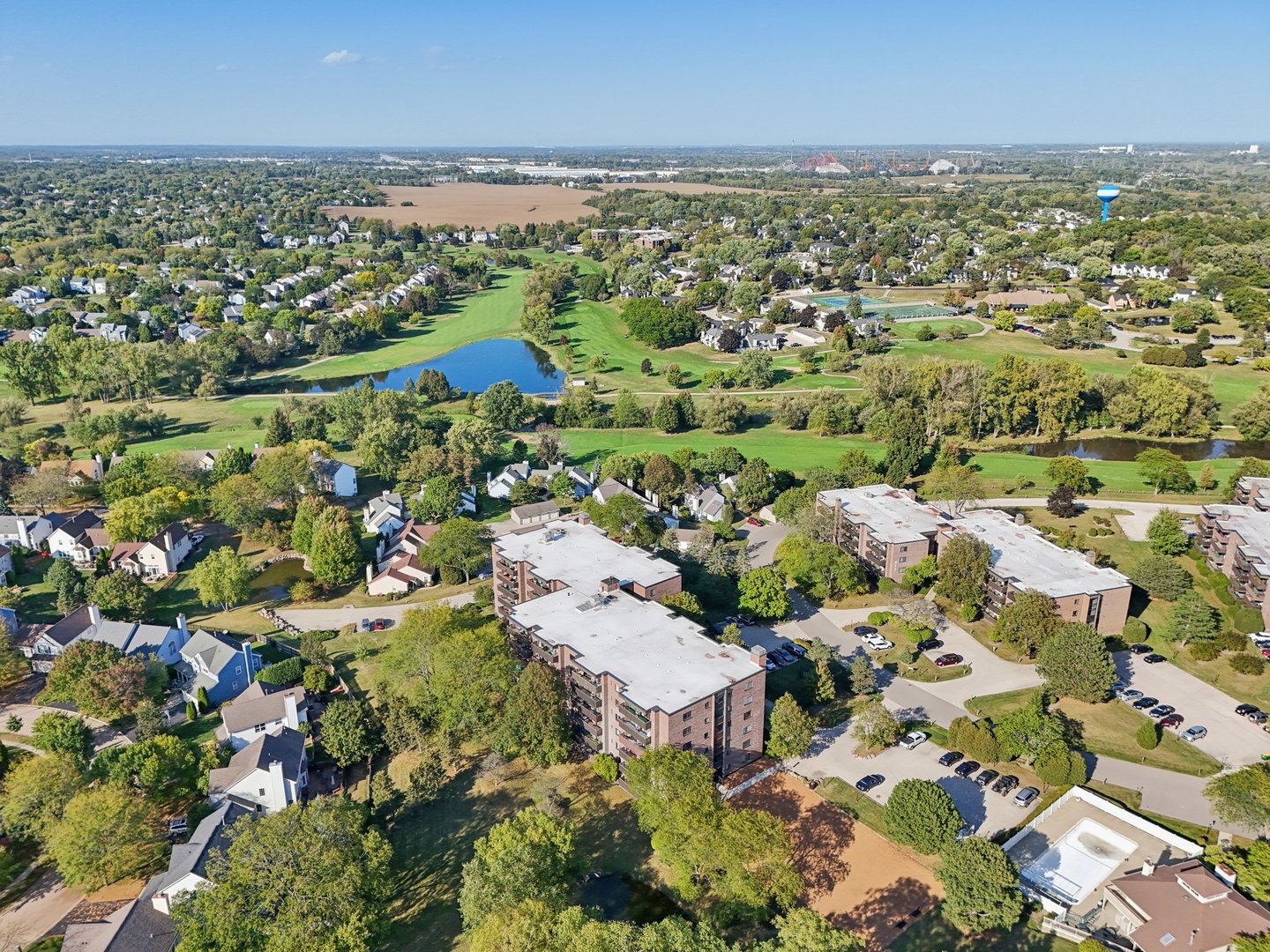 920 Vose Drive, Unit 106 Gurnee, IL 60031 - Photo 35 of 39 an aerial view of residential building with outdoor space