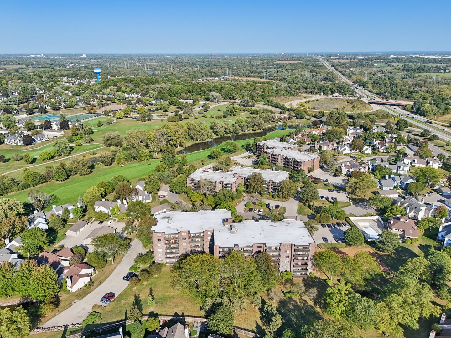 920 Vose Drive, Unit 106 Gurnee, IL 60031 - Photo 36 of 39 an aerial view of residential houses with outdoor space