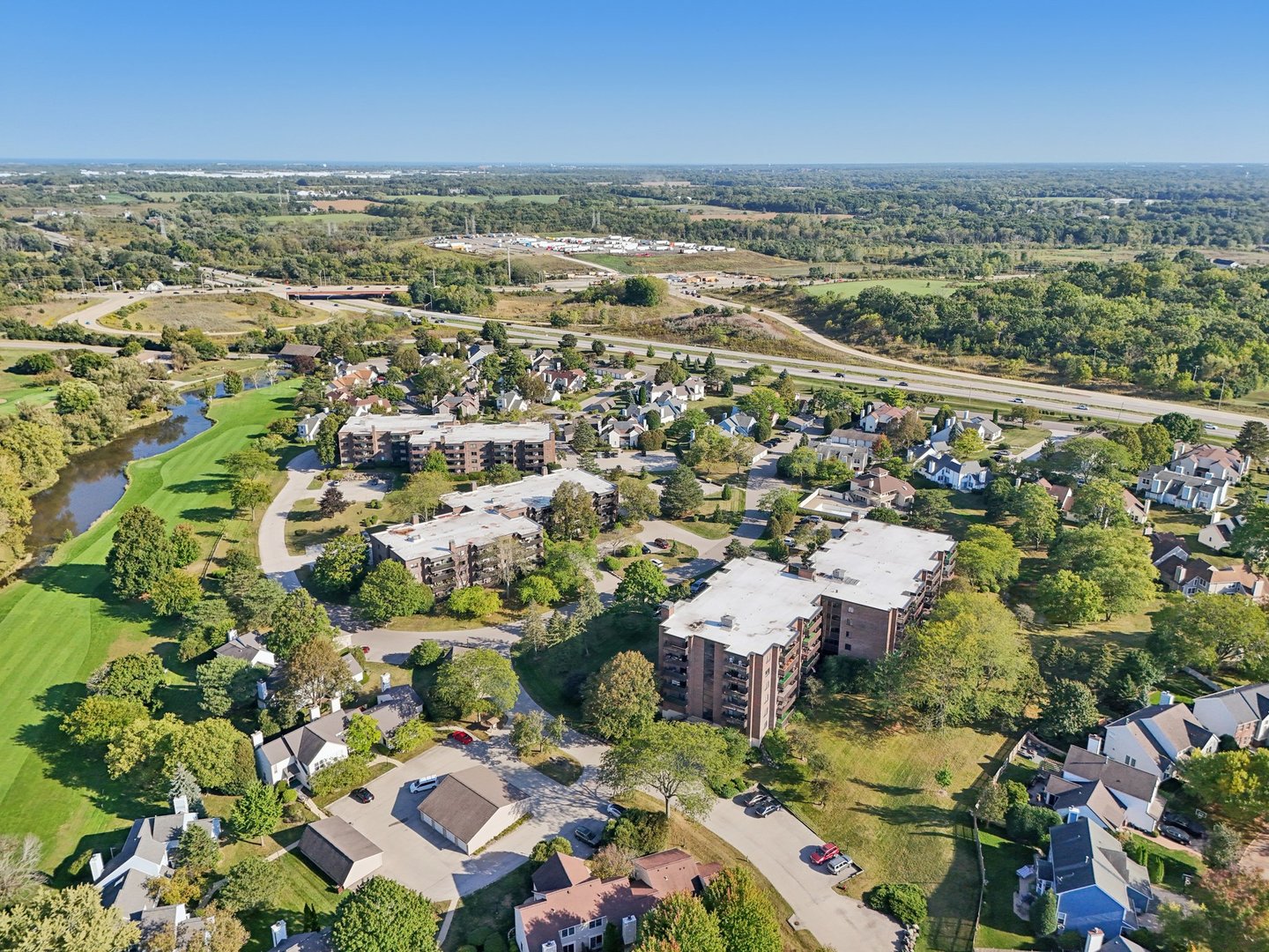 920 Vose Drive, Unit 106 Gurnee, IL 60031 - Photo 37 of 39 an aerial view of residential houses with outdoor space