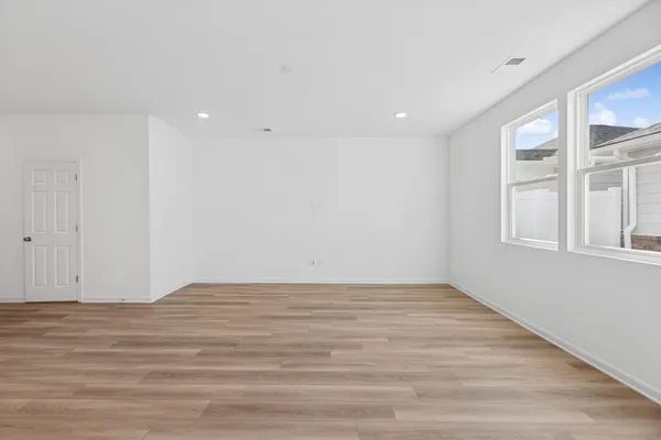 an empty room with windows