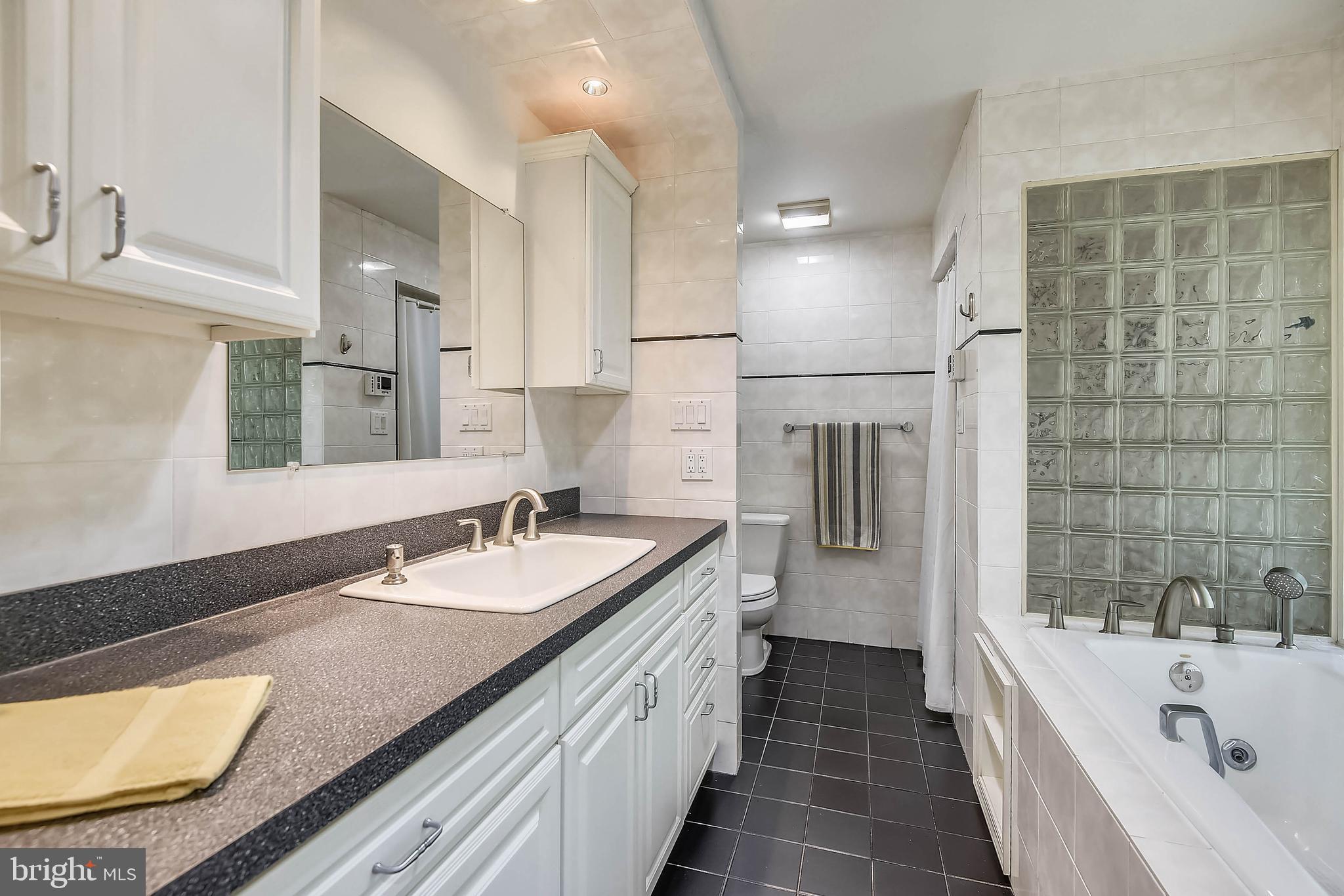 2405 Paddock Lane Reston, VA 20191 - Photo 23 of 50 Primary Bath with soaking tub and separate shower