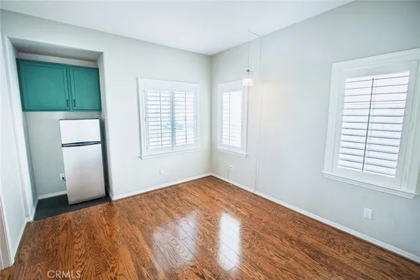 wooden floor and windows in a room