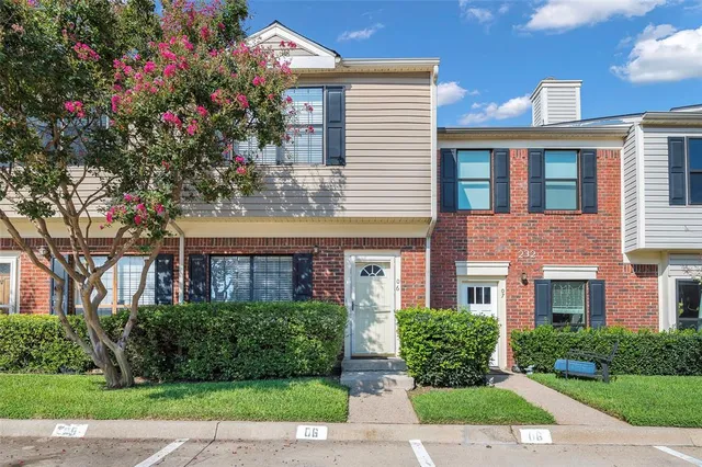 a front view of a multi story residential apartment buildings