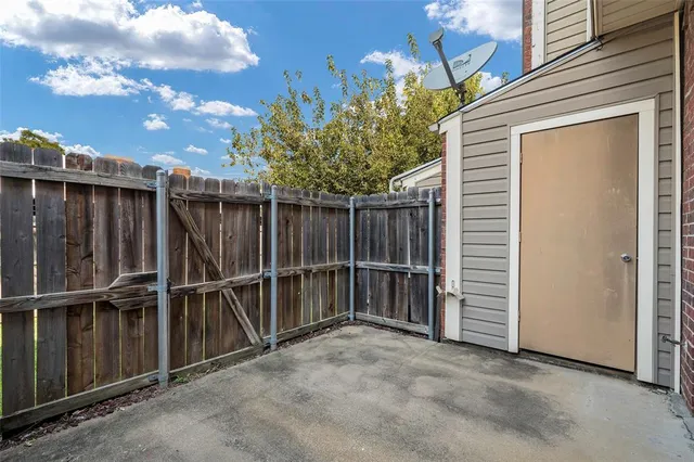 a view of a porch and garden