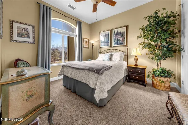 a view of a chairs and table in the patio
