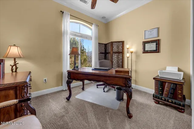 an aerial view of a house with outdoor space patio and swimming pool